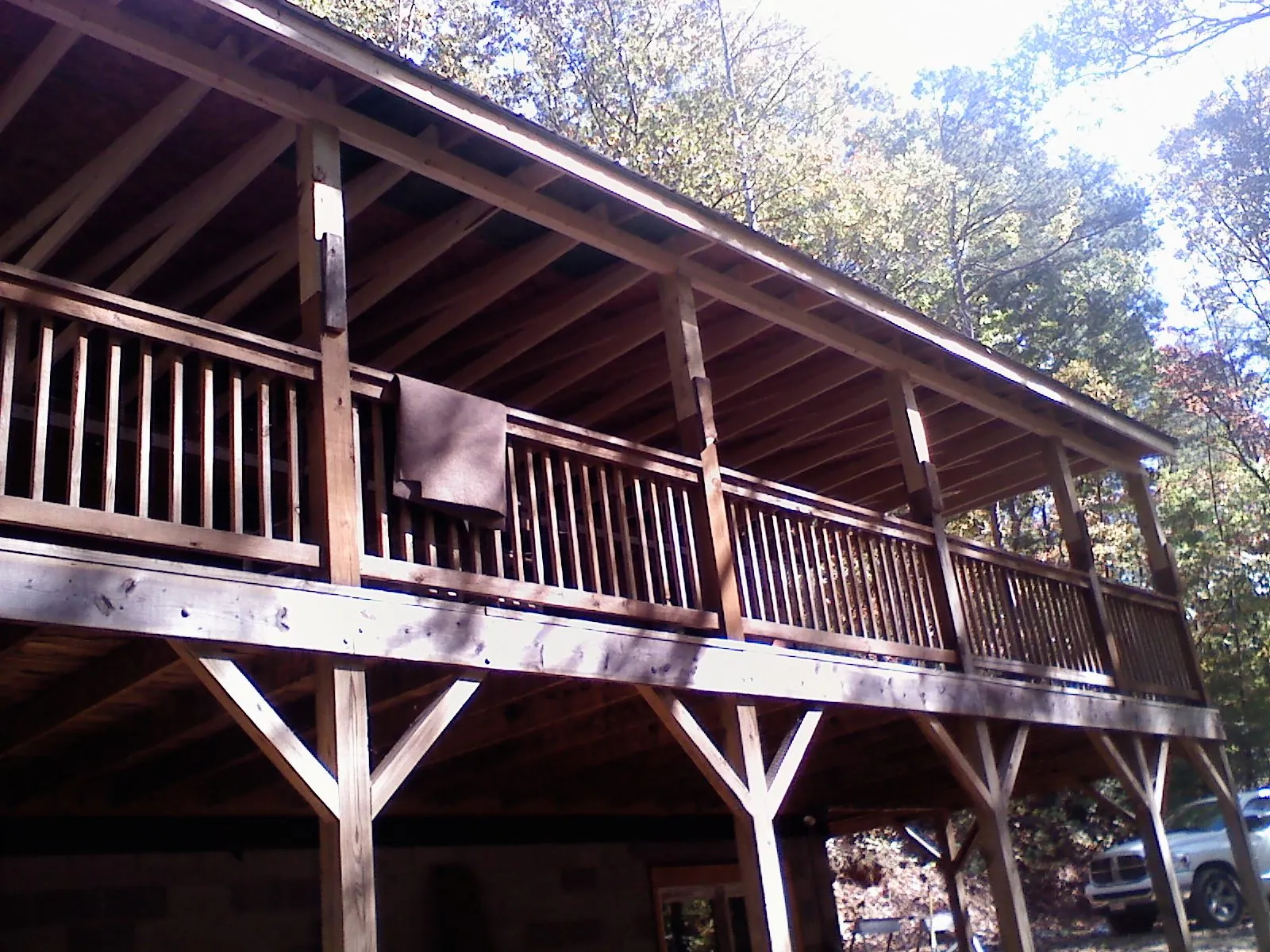 Timber framing under a new elevated porch and deck — Roof Leak Repair in Herminie by Roofing Brothers